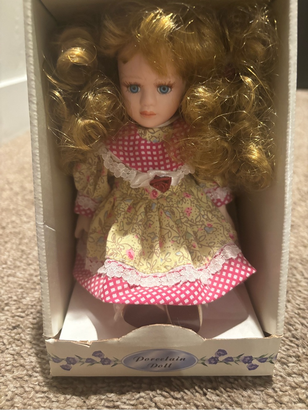 Porcelain Doll with Blonde Curls in Pink & Yellow Floral Dress